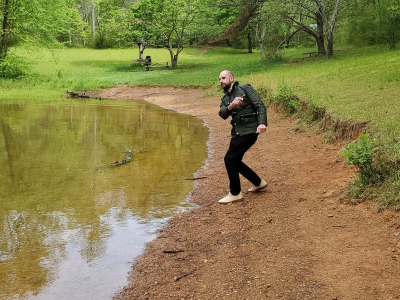 Tim Skipping Rocks in the Mountains