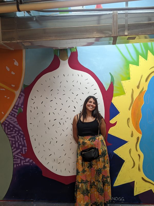 Megan With a Mural She Painted